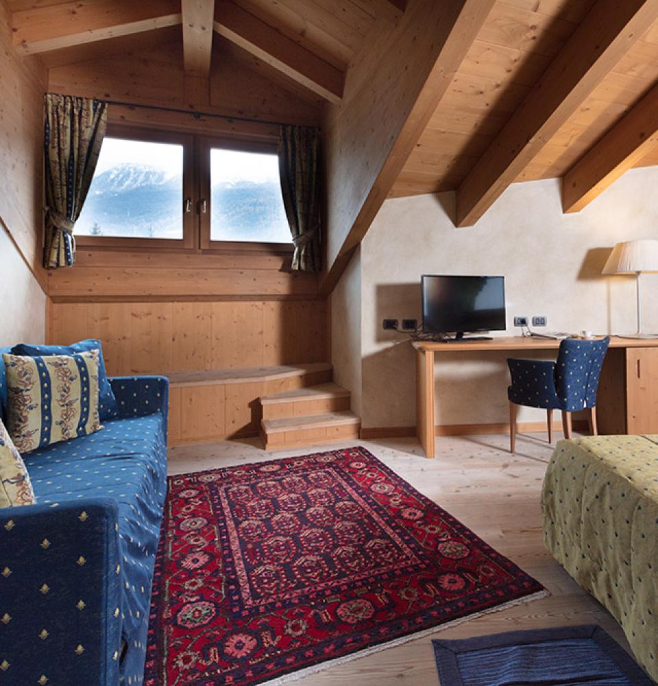 de_luxe_familia_ático_estilo_alpino_sofá_cama_vista_montaña-alpino-1